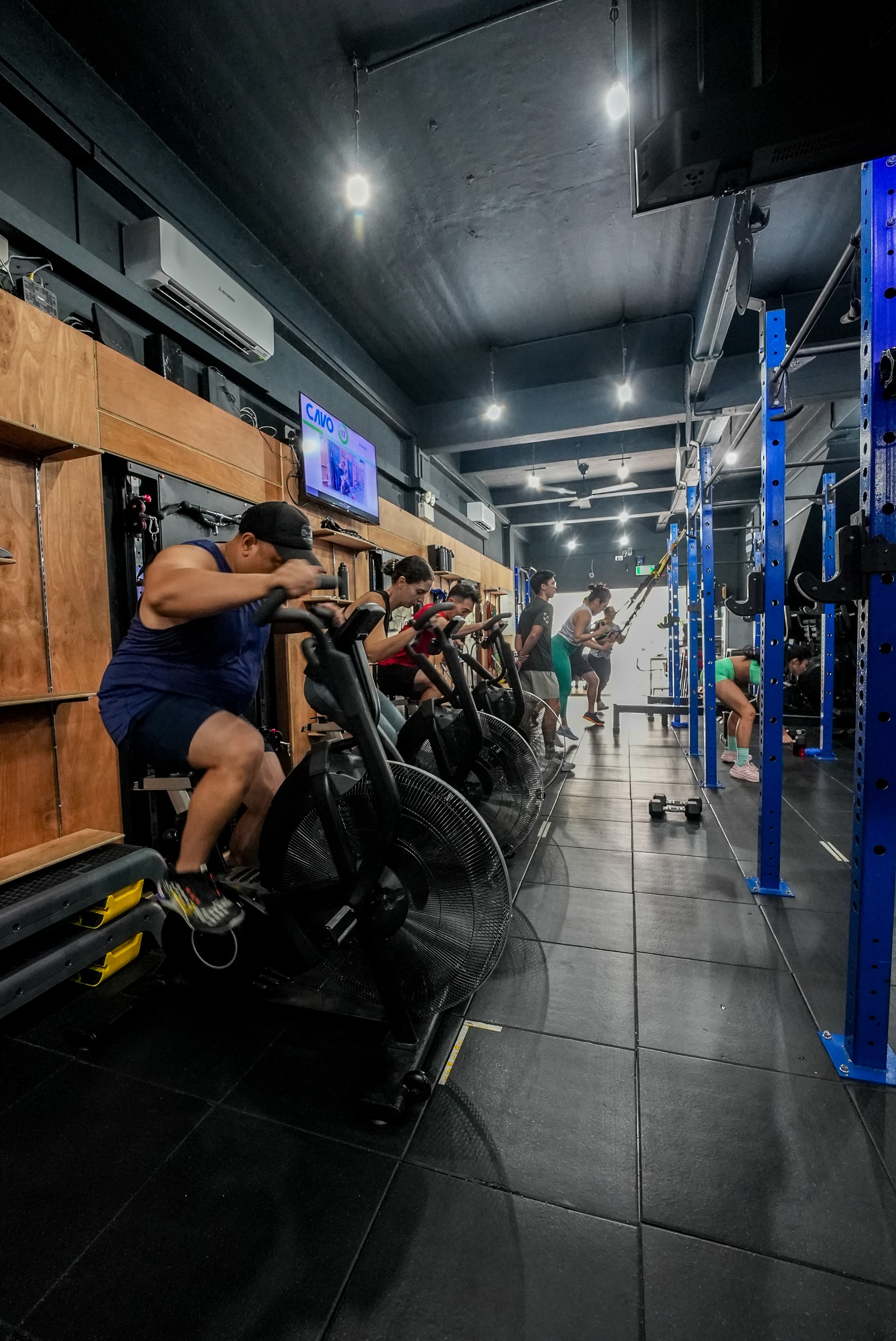 A person exercising on a rowing machine